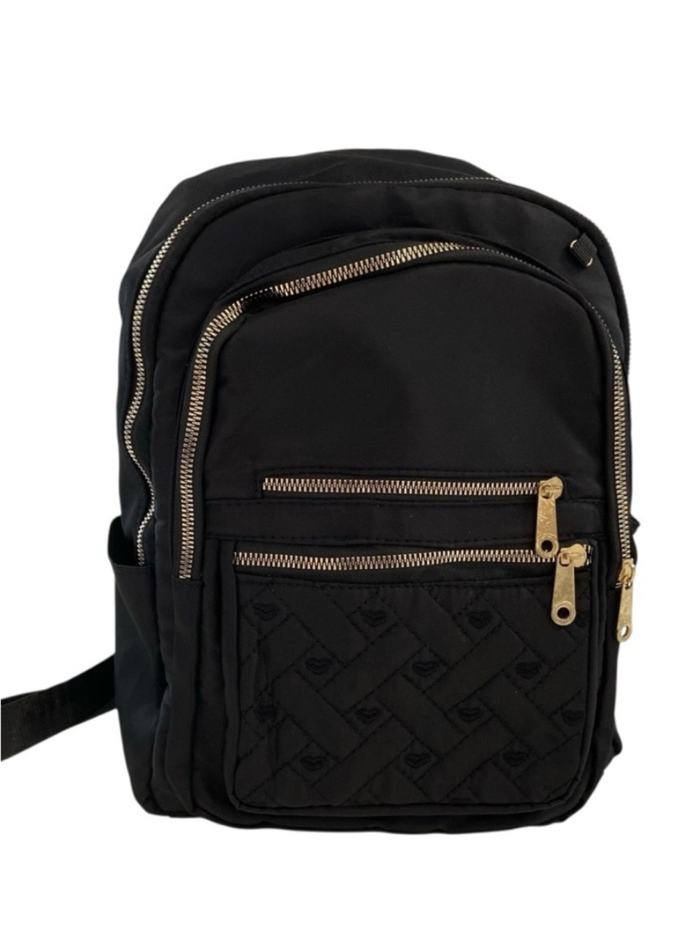 Sleek black quilted backpack with gold zipper accents versatile daily bag